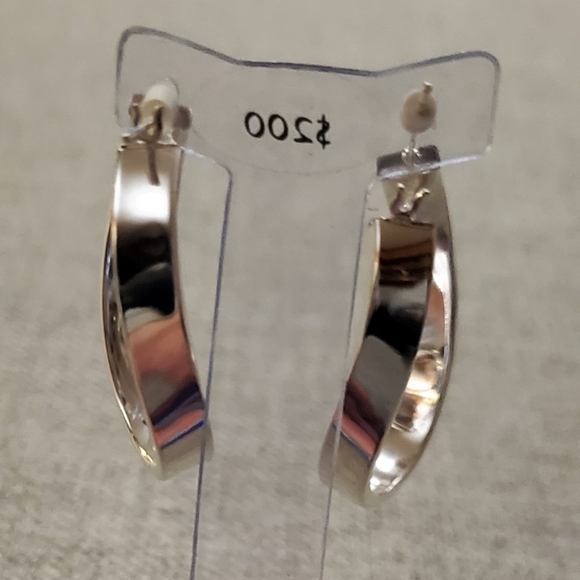 Sterling Silver Twisted Oval Hoop Earring - Picture 4 of 7